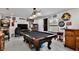 A game room featuring a pool table, comfortable seating, and a variety of recreational elements at 2926 Boating Blvd, Kissimmee, FL 34746