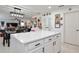 Spacious kitchen island with seating complemented by modern pendant lighting, perfect for entertaining and casual dining at 2926 Boating Blvd, Kissimmee, FL 34746