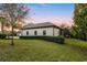 Well-maintained lawn surrounds this home's exterior featuring a tile roof at 3123 Bentonshire Pl, Longwood, FL 32779