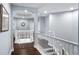 Upstairs hallway with stairs leading to the lower level at 3123 Bentonshire Pl, Longwood, FL 32779