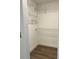 A closet with new flooring and white wire shelving at 3224 Holland Dr, Orlando, FL 32825