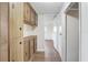 Hallway featuring wood cabinets and drawers at 34936 3Rd Ave, Leesburg, FL 34788