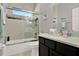 Modern bathroom with a glass-enclosed shower, tiled walls, and a sleek vanity at 398 Lake Amberleigh Dr, Winter Garden, FL 34787