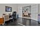 Office space with french doors leading to a dining area, natural light, and comfortable desk setup at 398 Lake Amberleigh Dr, Winter Garden, FL 34787