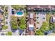 Aerial view showcasing the pool, parking, and architectural layout of the residential buildings within the community at 4367 Thornbriar Ln # P204, Orlando, FL 32822