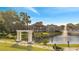 A beautiful community pond with fountains and a walking path for relaxing strolls, enhancing the neighborhood's charm at 4367 Thornbriar Ln # P204, Orlando, FL 32822