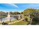 A tranquil community pond featuring a fountain, walking path, and charming gazebo, ideal for relaxation and enjoying nature at 4367 Thornbriar Ln # P204, Orlando, FL 32822