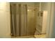 Bathroom with shower, tub and cabinet at 4650 Redmond Pl, Sanford, FL 32771