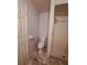 Bathroom with toilet and shower, features a tile floor at 550 Oak Branch Cir, Kissimmee, FL 34758