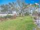 A beautiful backyard with green grass and beautiful trees for endless outdoor recreation at 607 Powers Ave, Port Orange, FL 32127