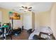 Bedroom featuring ceiling fan, and wood-look flooring at 618 Minnesota Ave, St Cloud, FL 34769