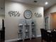 Dining area with unique wall decor, a decorative folding shelf and view into another room at 618 Minnesota Ave, St Cloud, FL 34769