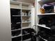 Spacious walk-in closet with shelving units for optimal storage and organization at 618 Minnesota Ave, St Cloud, FL 34769