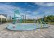 Fun splash pad with interactive water features, perfect for to cool off and play at 7071 Painted Bunting Way, St Cloud, FL 34773