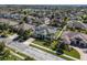 An aerial view of a well-maintained single Gathering home with landscaped yard in residential neighborhood at 713 Duff Dr, Winter Garden, FL 34787