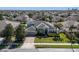 Aerial view of a well-manicured home with mature trees in a quiet neighborhood at 713 Duff Dr, Winter Garden, FL 34787