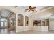 Wide open living area with columns and a view of the kitchen and entrance at 713 Duff Dr, Winter Garden, FL 34787