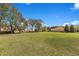 Expansive green open space, perfect for recreation and enjoying the outdoors at 8718 Shimmering Pine Pl, Sanford, FL 32771