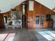 Interior view of a spacious living room featuring a fireplace and vaulted ceilings at 8801 Hackney Prairie Rd, Orlando, FL 32818