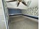 Room showcasing tile flooring, decorative wall paper and ceiling fan at 8801 Hackney Prairie Rd, Orlando, FL 32818