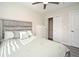 Bedroom featuring a ceiling fan, wood-look floors, a dresser, and a closet at 938 S Bumby Ave, Orlando, FL 32806