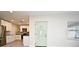 View into dining room and kitchen with great natural lighting at 938 S Bumby Ave, Orlando, FL 32806