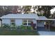 Charming single-story home with a well-maintained lawn and updated landscaping at 938 S Bumby Ave, Orlando, FL 32806