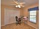 Cozy bedroom with a ceiling fan and closet at 1010 High Vista Dr, Davenport, FL 33837