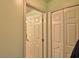 Hallway with closets and view of a bathroom at 1010 High Vista Dr, Davenport, FL 33837