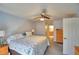 Main bedroom featuring a ceiling fan, closet, and bathroom at 1010 High Vista Dr, Davenport, FL 33837