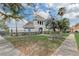 Exterior view of the community building and landscaping at 13046 Island Breeze Ct, Orlando, FL 32824