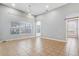 Expansive living room with tile flooring, tall ceilings, and large windows, creating a bright and airy atmosphere at 13046 Island Breeze Ct, Orlando, FL 32824