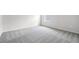 Large bedroom with natural light coming in from single window and carpet flooring at 13348 Panama Beach Ct, Orlando, FL 32827