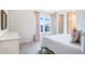 Cozy bedroom with carpet, large window, and stylish furnishings at 13348 Panama Beach Ct, Orlando, FL 32827