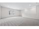 Spacious carpeted bonus room with multiple windows and neutral paint color at 13348 Panama Beach Ct, Orlando, FL 32827