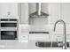 Close up on kitchen featuring modern appliances and beautiful granite countertops at 13348 Panama Beach Ct, Orlando, FL 32827