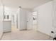 Bathroom featuring neutral tile flooring, white walls, and a vanity with a white countertop at 15 Silver Park Cir, Kissimmee, FL 34743