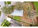 Aerial view of home showcasing the yard and landscaping at 15848 Autumn Glen Ave, Clermont, FL 34714