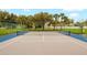 A well-maintained tennis court offers residents recreation and competitive play at 15848 Autumn Glen Ave, Clermont, FL 34714