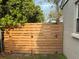 Newly constructed wooden fence provides privacy and enhances the aesthetic appeal of the backyard at 161 Randia Dr, Orlando, FL 32807