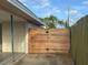 Modern wooden fence provides privacy to the property at 161 Randia Dr, Orlando, FL 32807