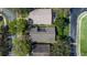 An aerial view of a home showing a unique skylight on the roof at 17343 Summer Oak Ln, Clermont, FL 34711