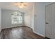 Cozy bedroom with a ceiling fan, a large window, and a closet at 17343 Summer Oak Ln, Clermont, FL 34711