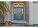 Close up of the front entrance featuring a decorative door and sidelights at 1879 Grey Fox Dr, Lakeland, FL 33810