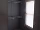 Empty closet with wire shelving and a window allowing natural light at 204 S Center St, Eustis, FL 32726