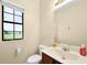 A bright bathroom with a large window offering a lovely view of the outdoors at 20648 Maxim Pkwy Pkwy, Orlando, FL 32833