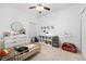 Well-organized room, with white furniture, toys and hardwood floors at 20648 Maxim Pkwy Pkwy, Orlando, FL 32833