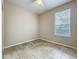 Bright bedroom with large window and neutral color palette at 250 Ryans Ridge Ave, Eustis, FL 32726