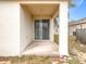 Covered back patio featuring a concrete slab and sliding glass doors at 250 Ryans Ridge Ave, Eustis, FL 32726