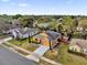 Aerial view of a single-Gathering home with solar panels on the roof at 281 Edisto Pl, Apopka, FL 32712